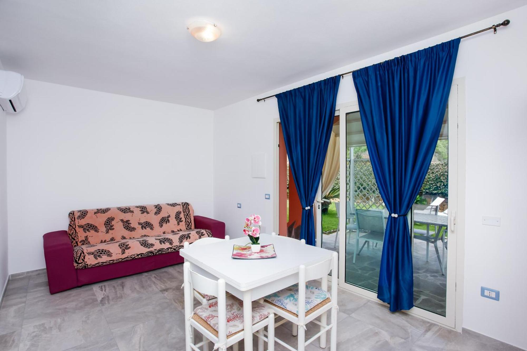 Residence Le Colonnine San Teodoro  Bagian luar foto
